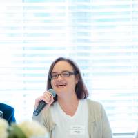 woman on panel answers question